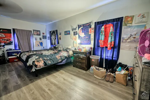 a view of a livingroom with furniture and front door