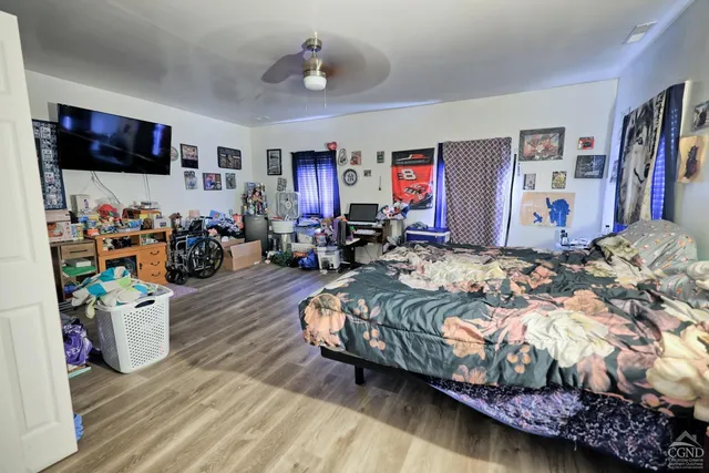 a front view of a house with a yard outdoor seating and deck