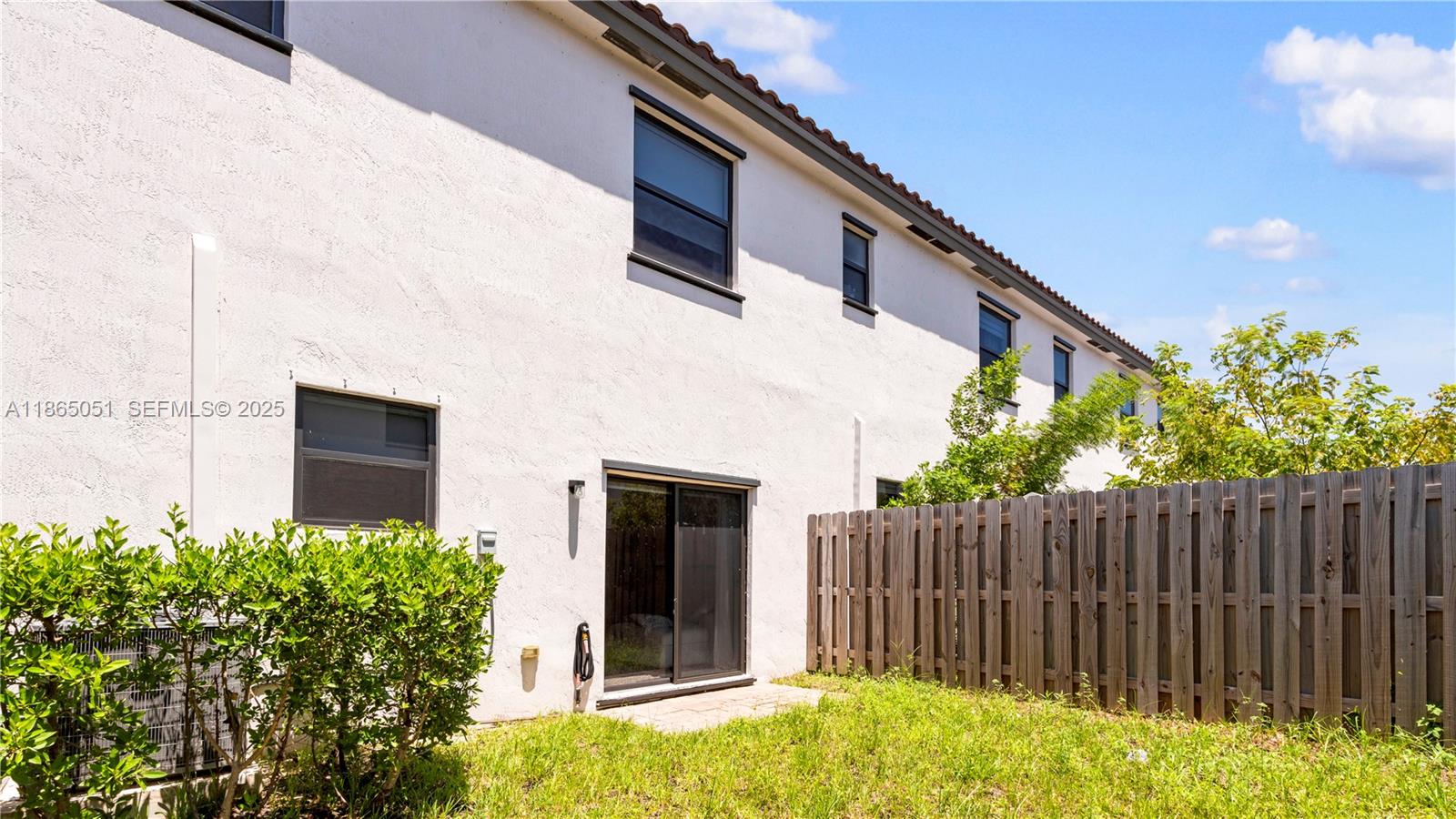 11922 Southwest 245 Terrace Homestead, FL 33032 - Photo 26 of 31 a house view with a backyard space