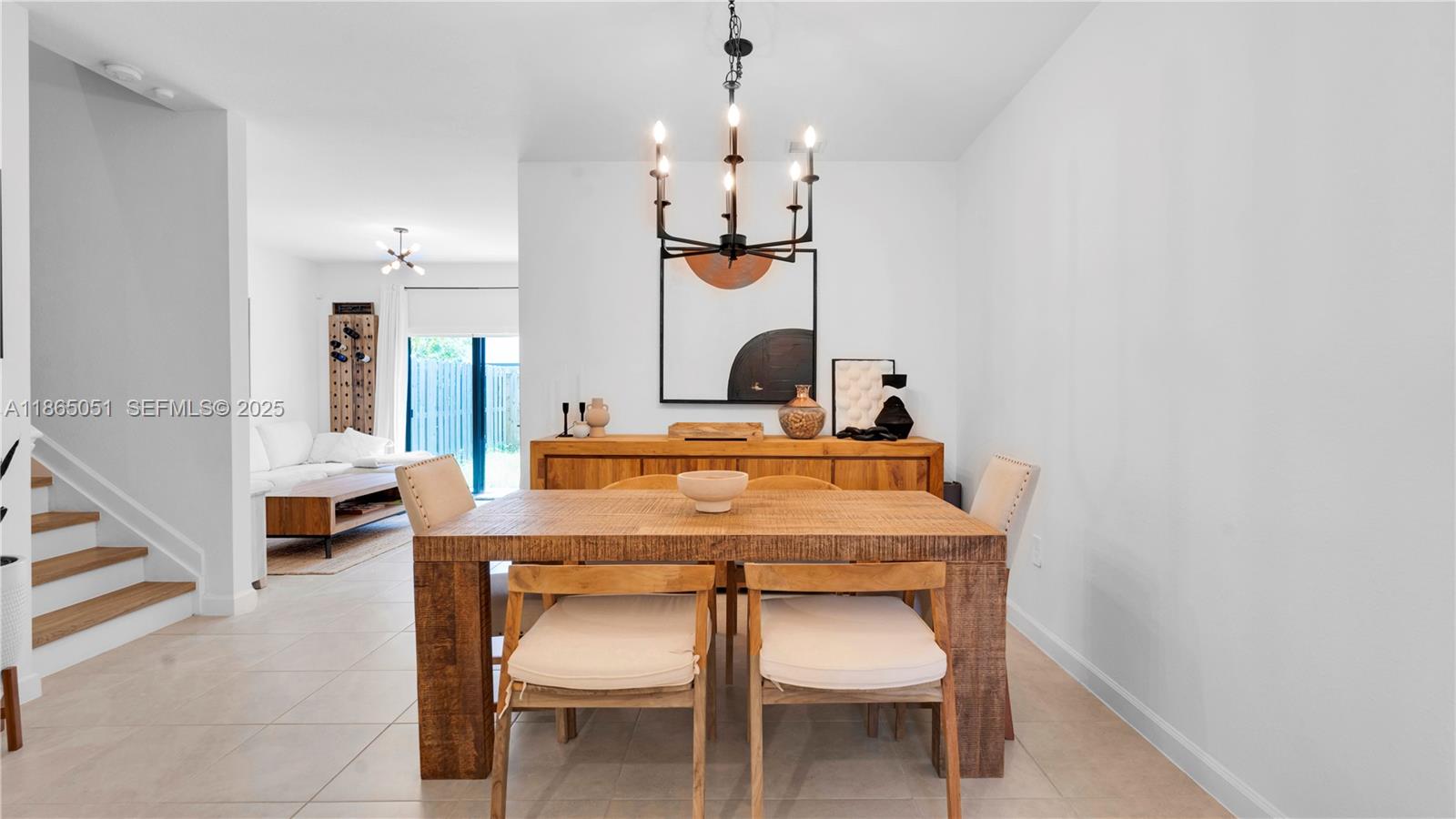 11922 Southwest 245 Terrace Homestead, FL 33032 - Photo 5 of 31 a dining room with table and chairs