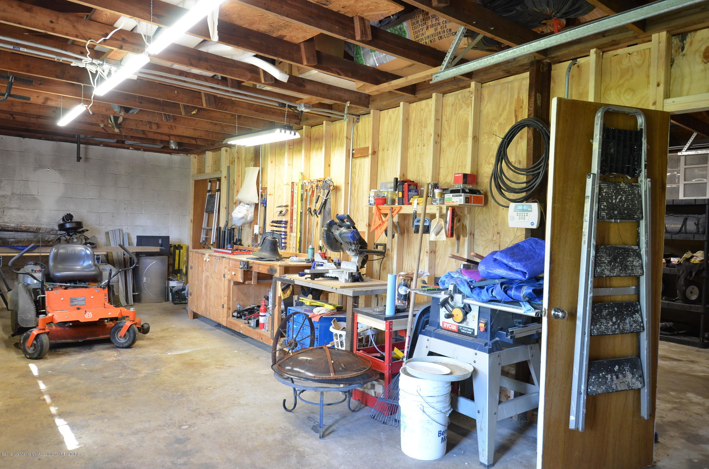 4497 Pleasant Hill Road Olive Branch, MS 38654 - Photo 28 of 31 Inside garage