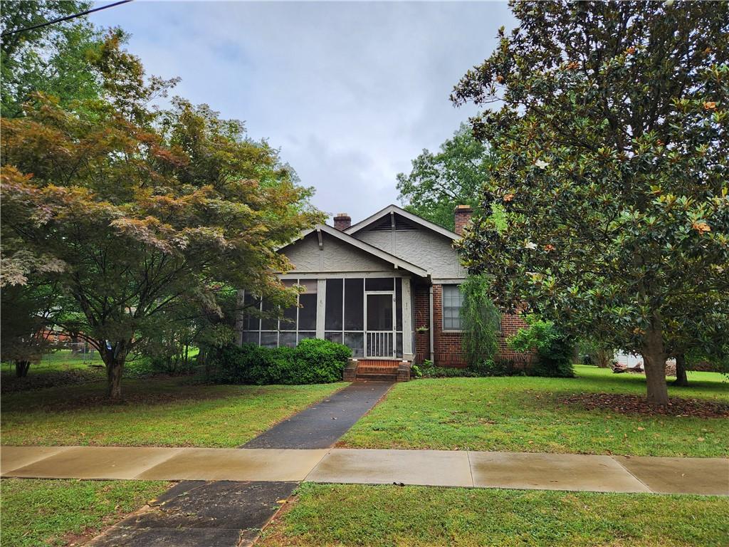 1 3rd Street Gainesville, GA 30504 - Photo 1 of 1 a front view of a house with a yard