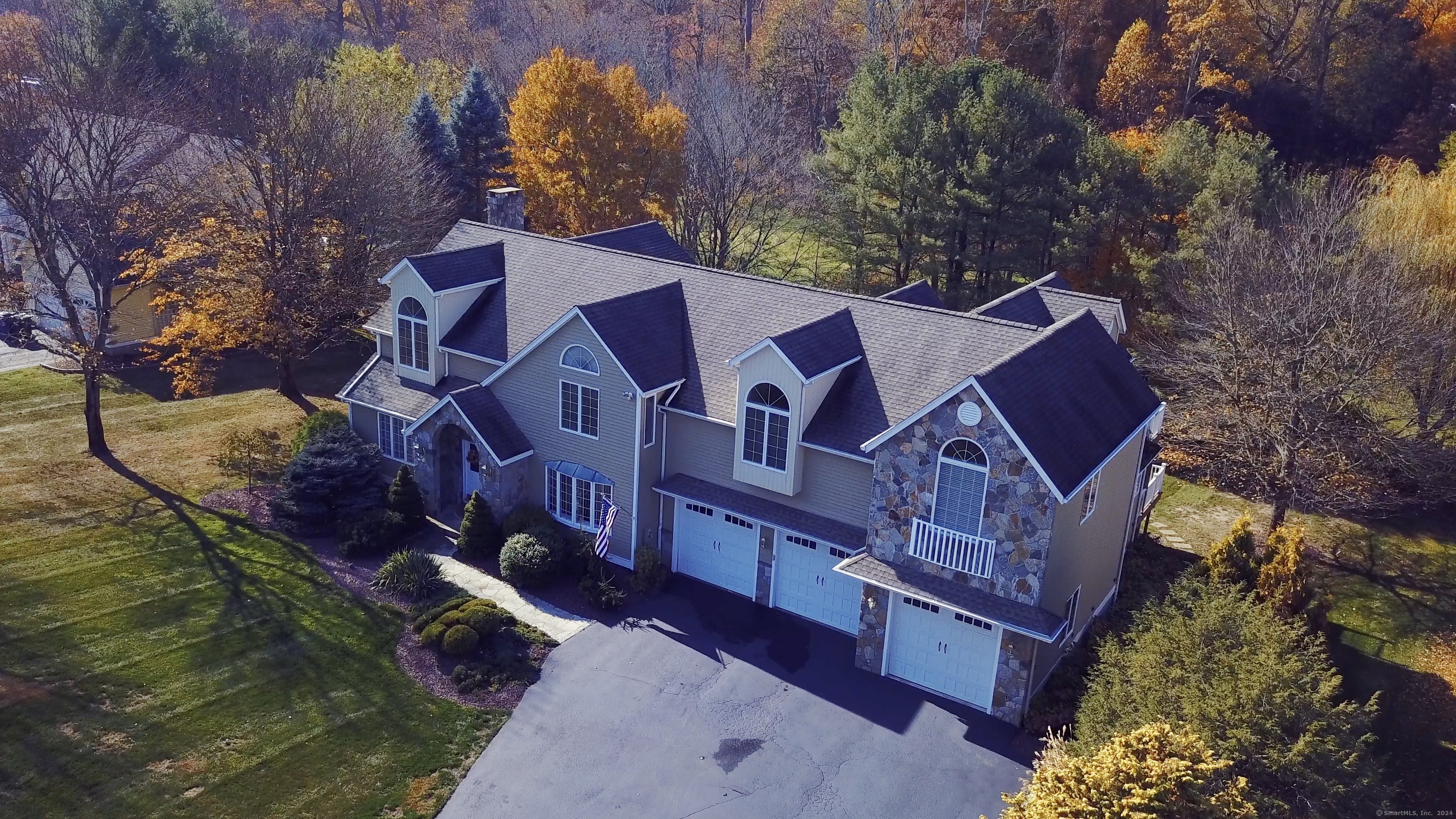 8 Windmill Lane Trumbull, CT 06611 - Photo 1 of 1 a aerial view of a house with a yard