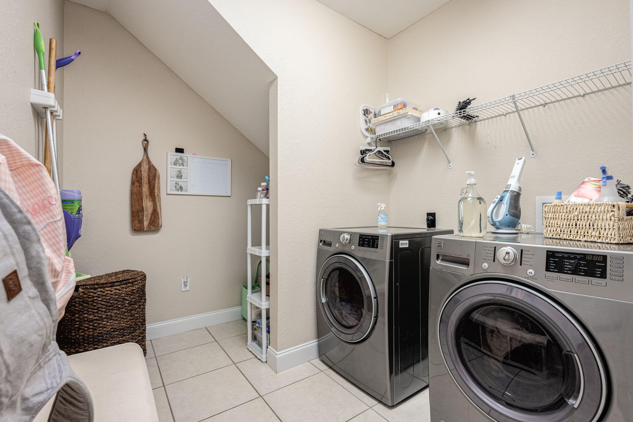 4591 Hermosa Road Crestview, FL 32539 - Photo 38 of 59 a view of a storage & utility room with washer and dryer