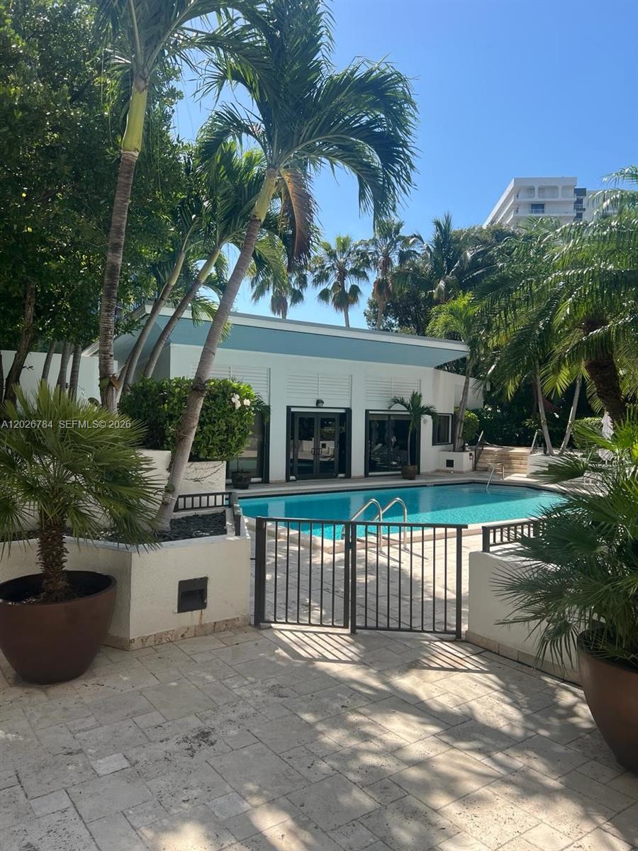 151 Southeast 15th Road, Unit 601 Miami, FL 33129 - Photo 35 of 36 a view of a house with a yard