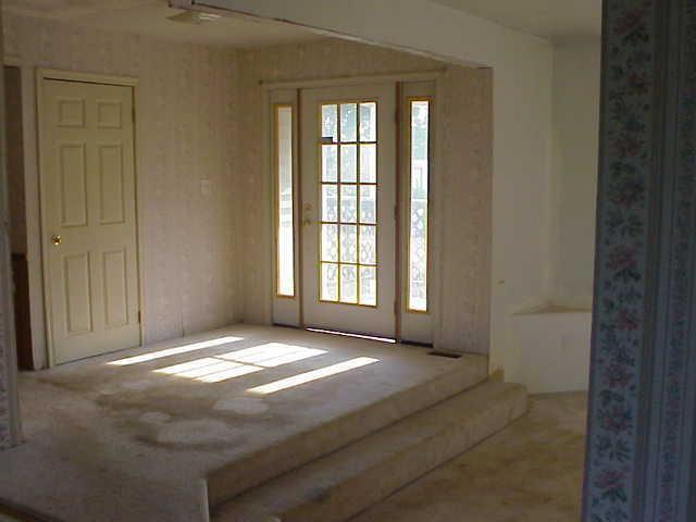 101 Board Mountain Road Goodview, VA 24095 - Photo 3 of 4 a view of an empty room with windows