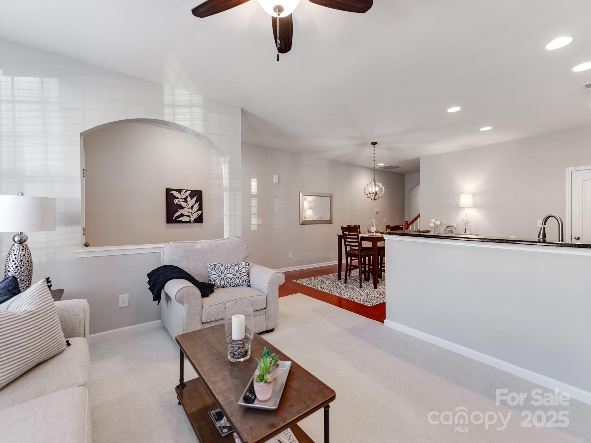 8244 Viewpoint Lane Cornelius, NC 28031 - Photo 8 of 33 a living room with furniture