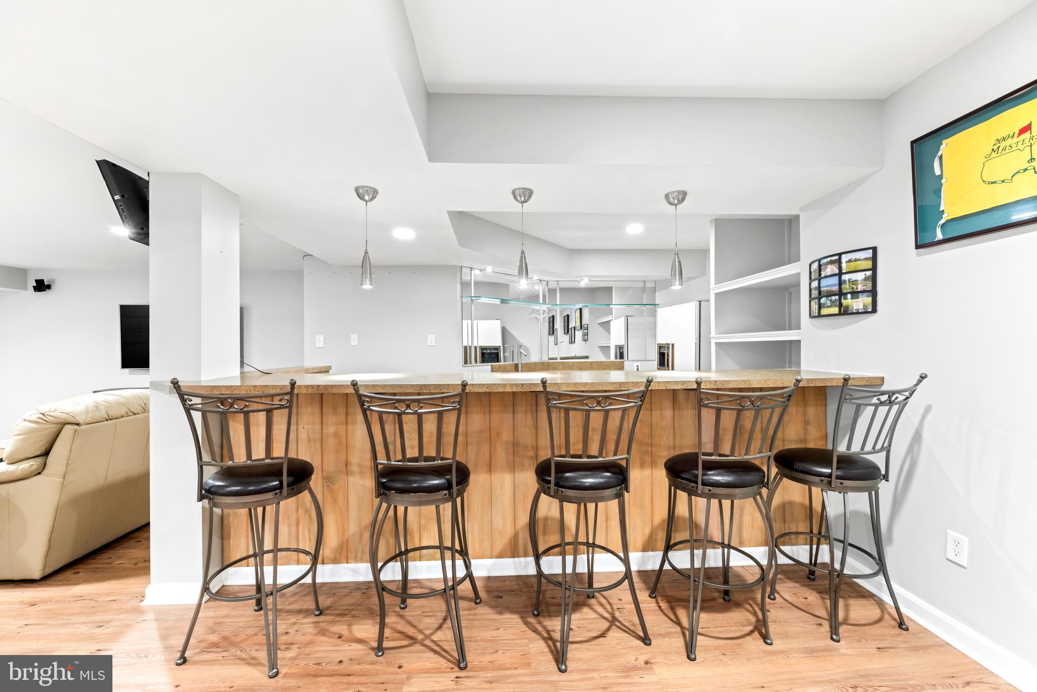 1552 Shipsview Road Annapolis, MD 21409 - Photo 115 of 129 Watching games & a bar go hand in hand!