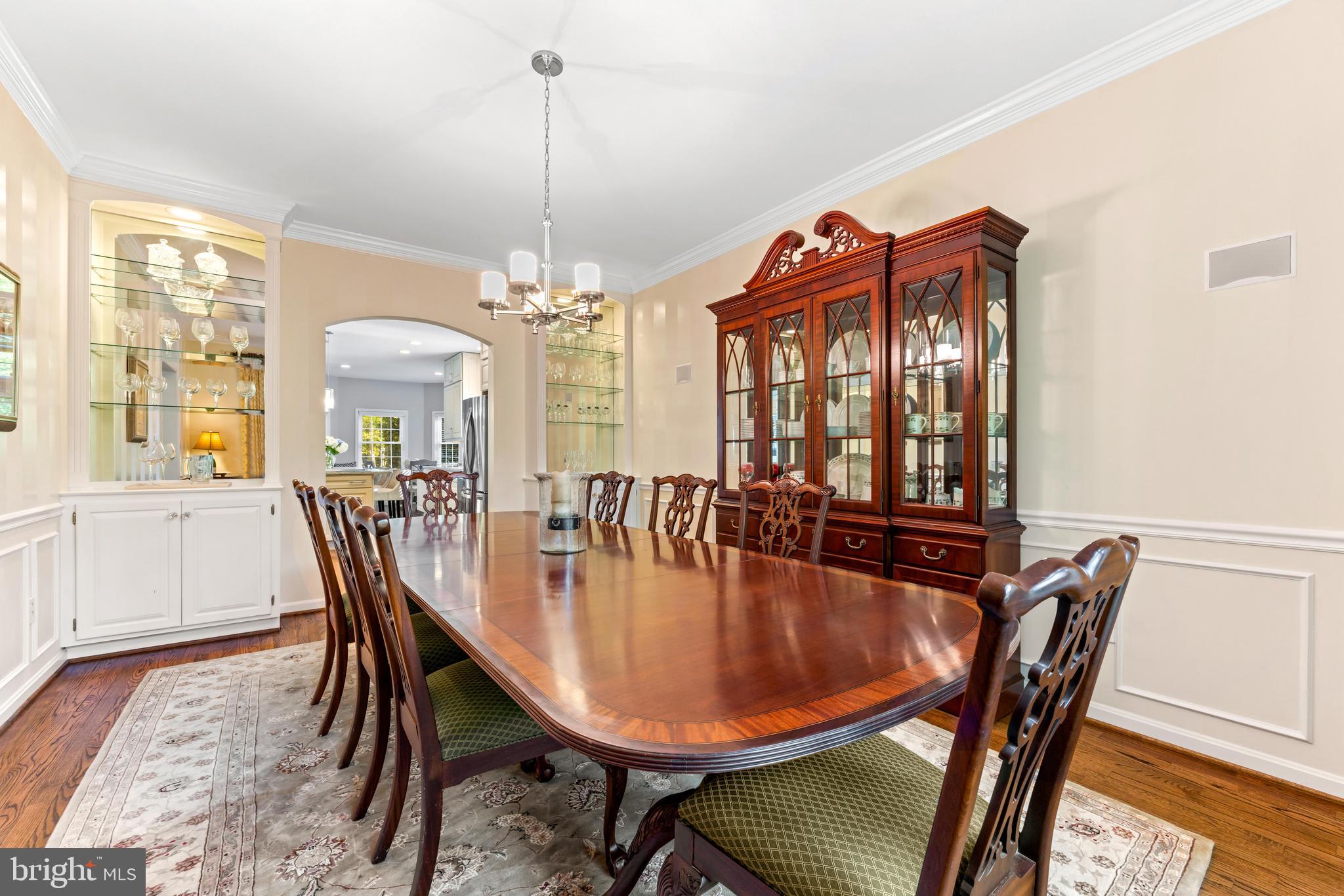 1552 Shipsview Road Annapolis, MD 21409 - Photo 19 of 129 Formal dining room off foyer w/custom cabinets