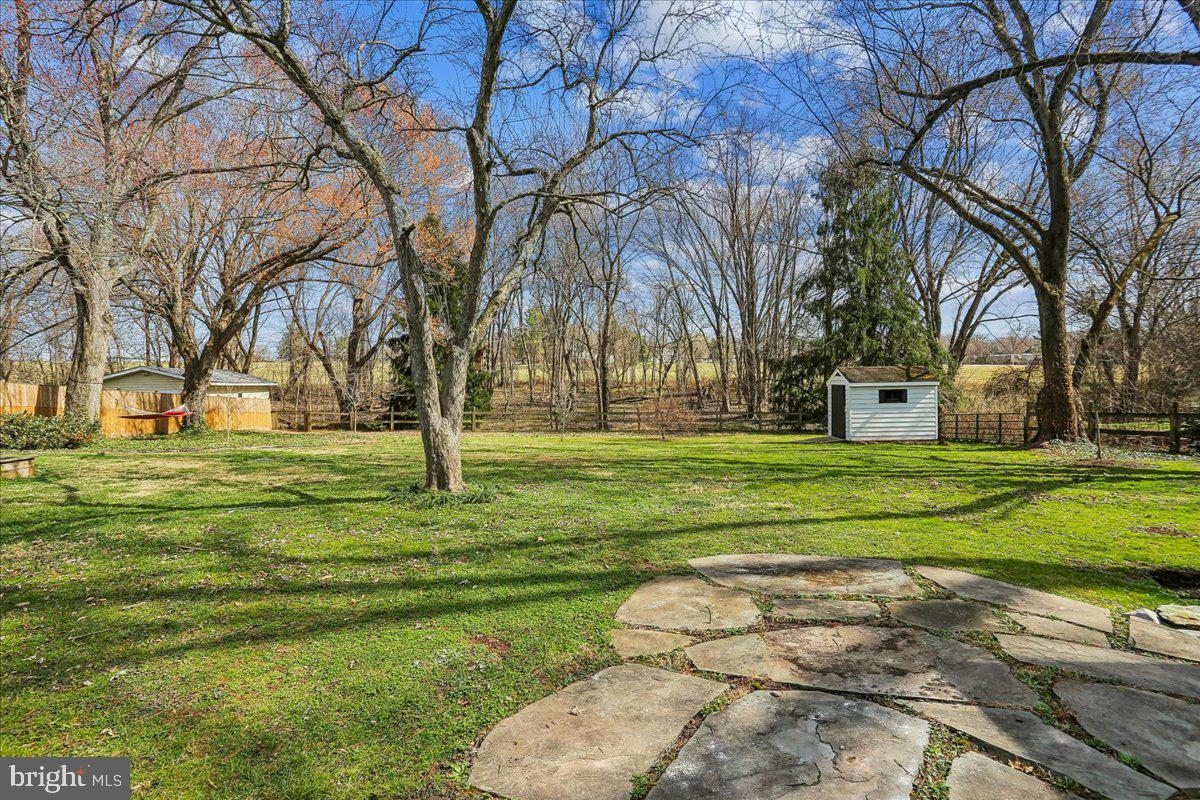 22325 Nicholson Farm Road Dickerson, MD 20842 - Photo 17 of 32 a garden view with tall trees