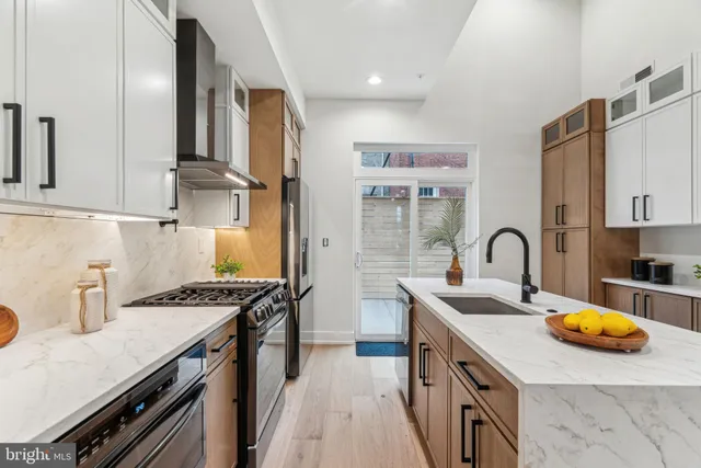 a view of a hallway with bathroom