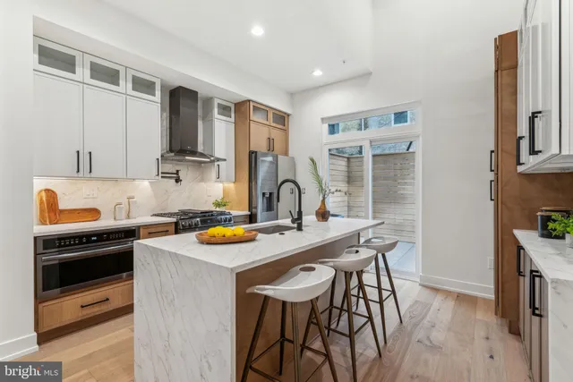 a view of living room filled with furniture and window