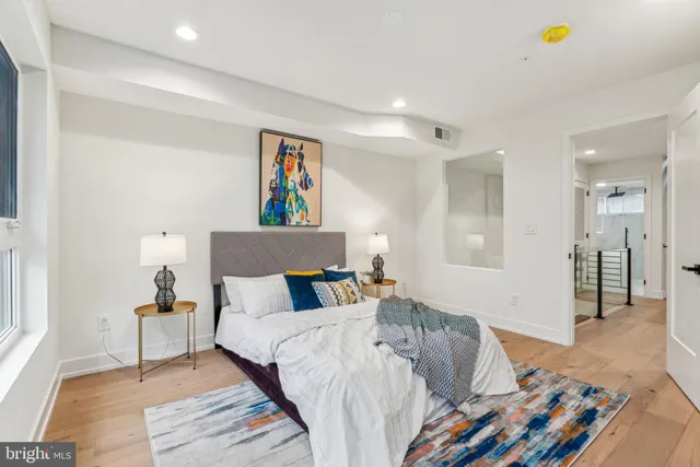 a view of a hallway with washer and dryer