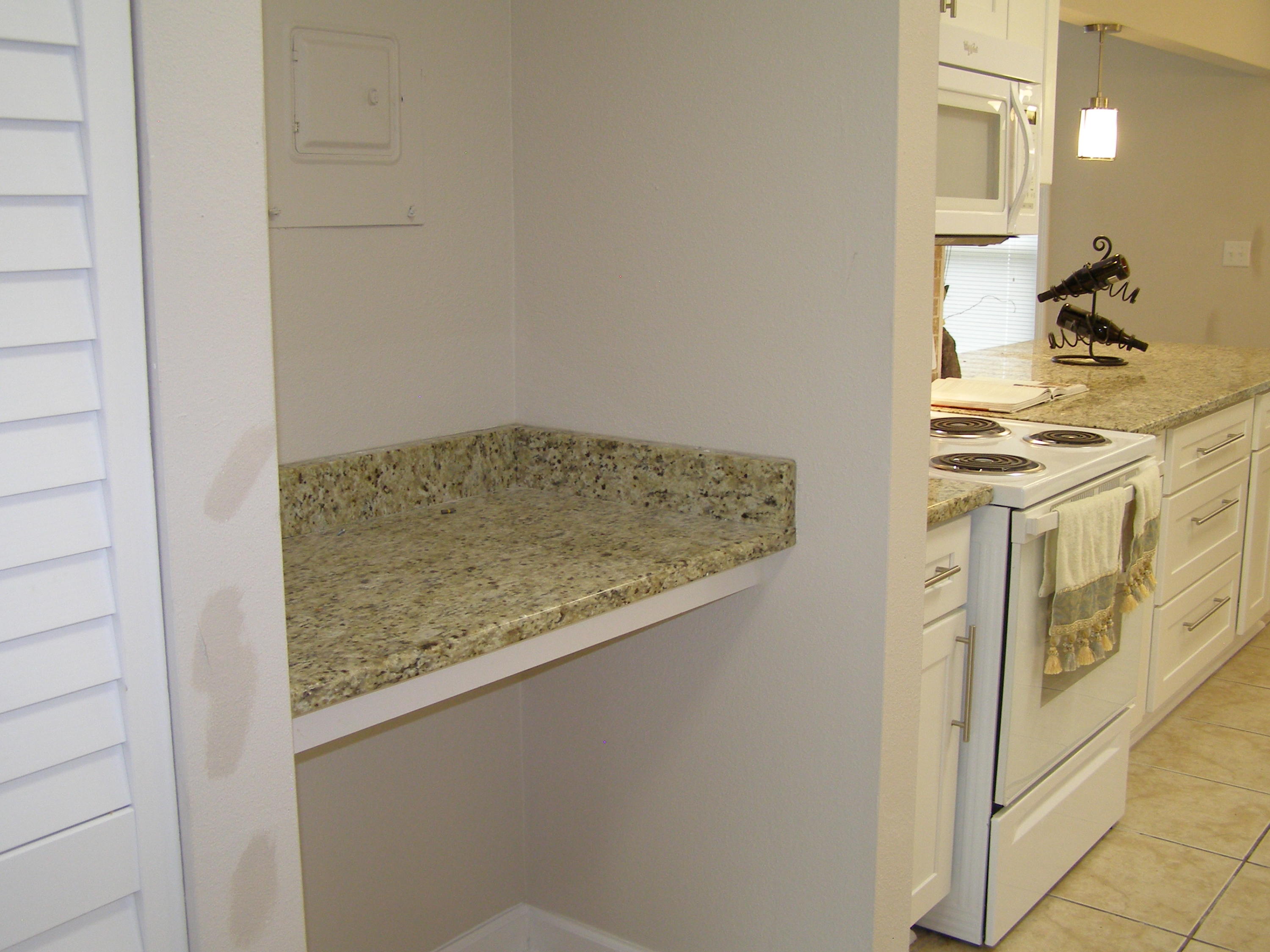 3356 Auburn Road Crestview, FL 32539 - Photo 12 of 34 a view of a kitchen cabinets
