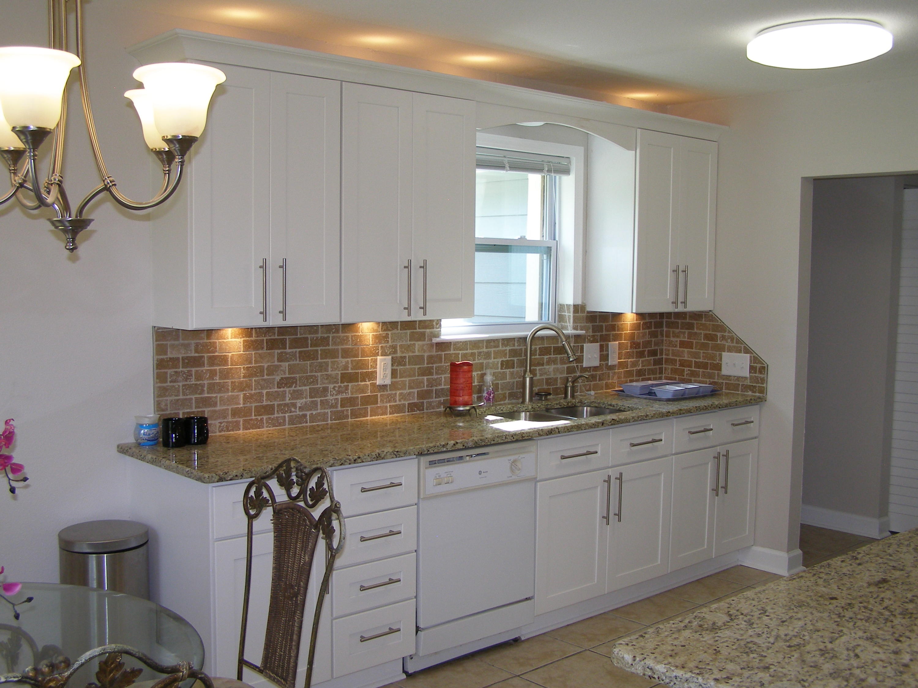 3356 Auburn Road Crestview, FL 32539 - Photo 8 of 34 a kitchen with sink and cabinets