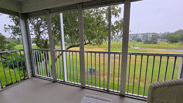 a view of a balcony with lake view