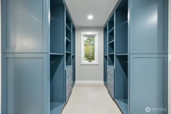 a bathroom with a granite countertop sink mirror and double