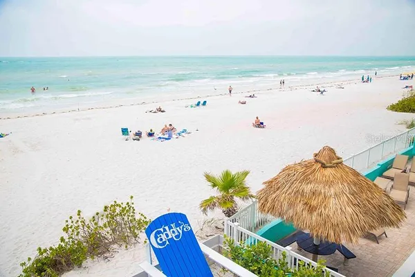 a view of a swimming pool and an outdoor space