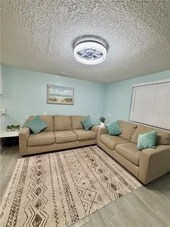 a living room with furniture and a couch