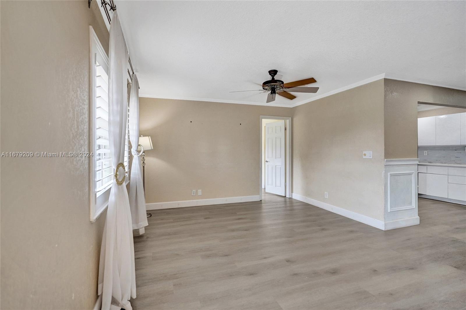 9737 Alaska Circle Boca Raton, FL 33434 - Photo 11 of 37 a view of entryway with wooden floor