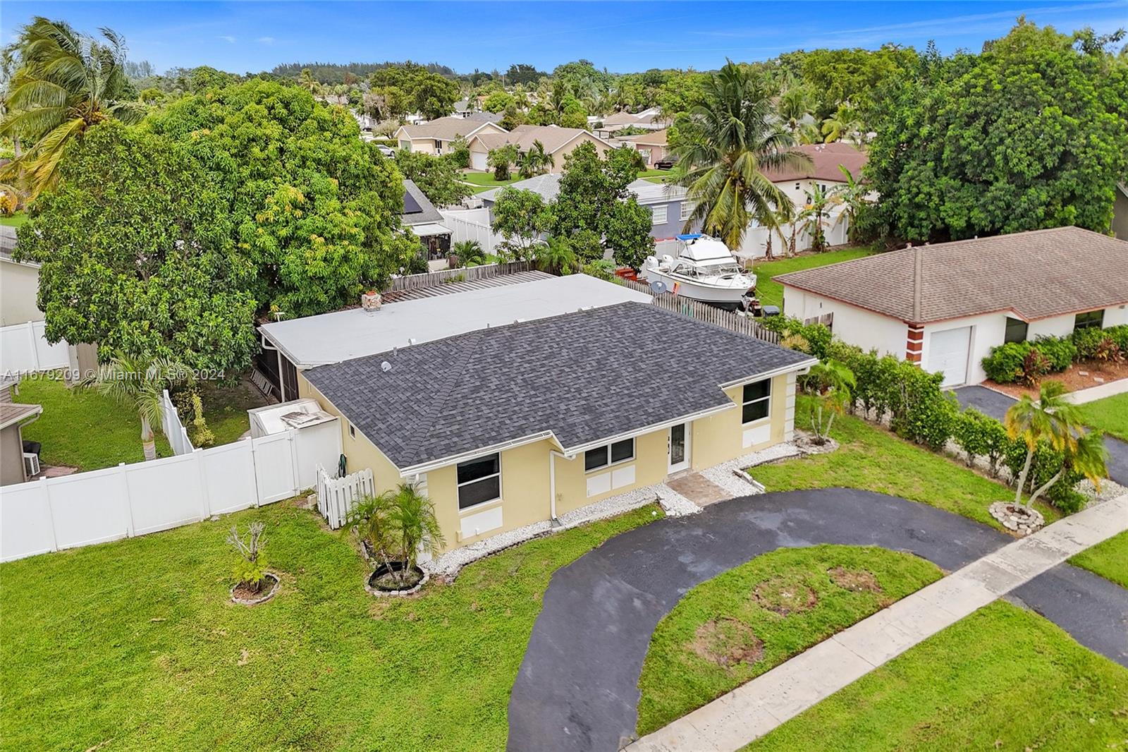 9737 Alaska Circle Boca Raton, FL 33434 - Photo 2 of 37 an aerial view of a house