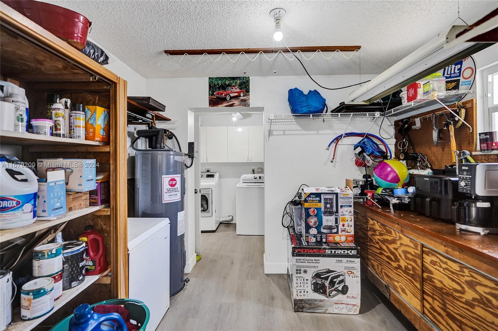 9737 Alaska Circle Boca Raton, FL 33434 - Photo 25 of 37 a view of storage and utility room