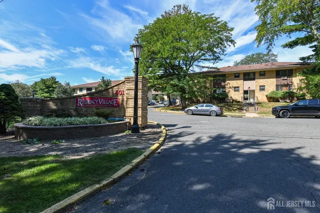 a view of a street with cars park