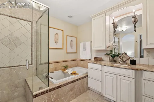 a bathroom with a granite countertop sink mirror and a