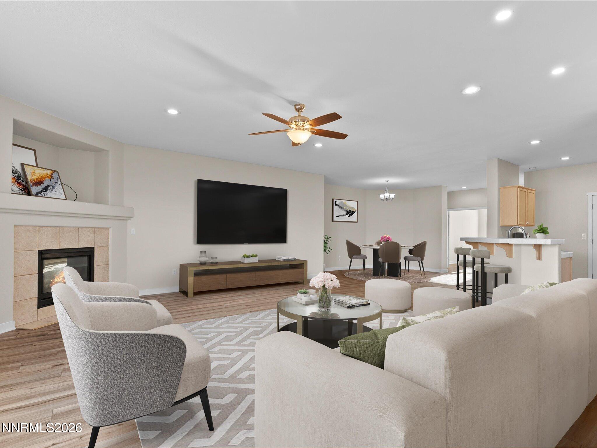 5570 Knoll View Way Sparks, NV 89436 - Photo 20 of 69 a living room with furniture and a flat screen tv