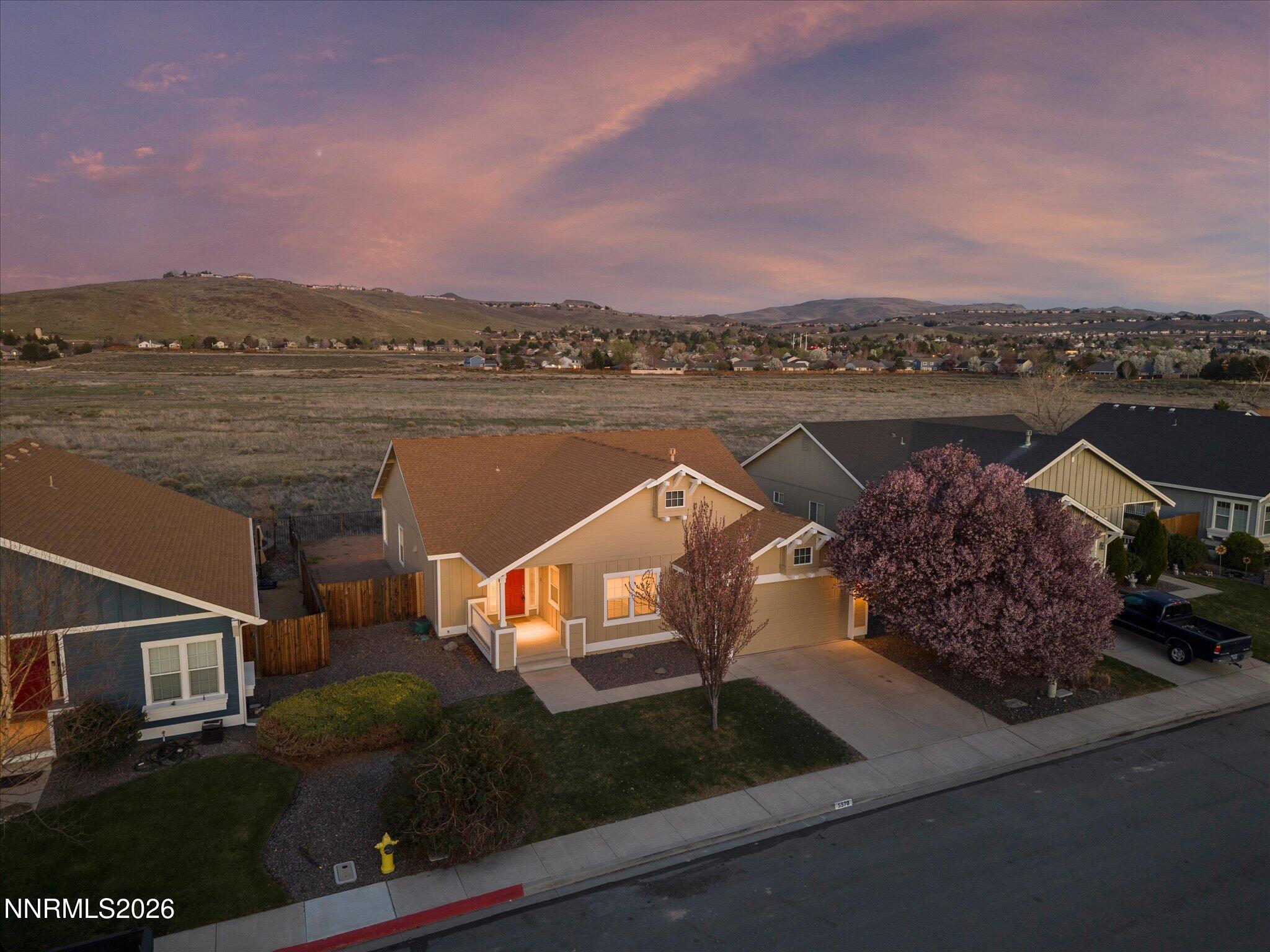 5570 Knoll View Way Sparks, NV 89436 - Photo 2 of 69 an aerial view of a house with a lake view