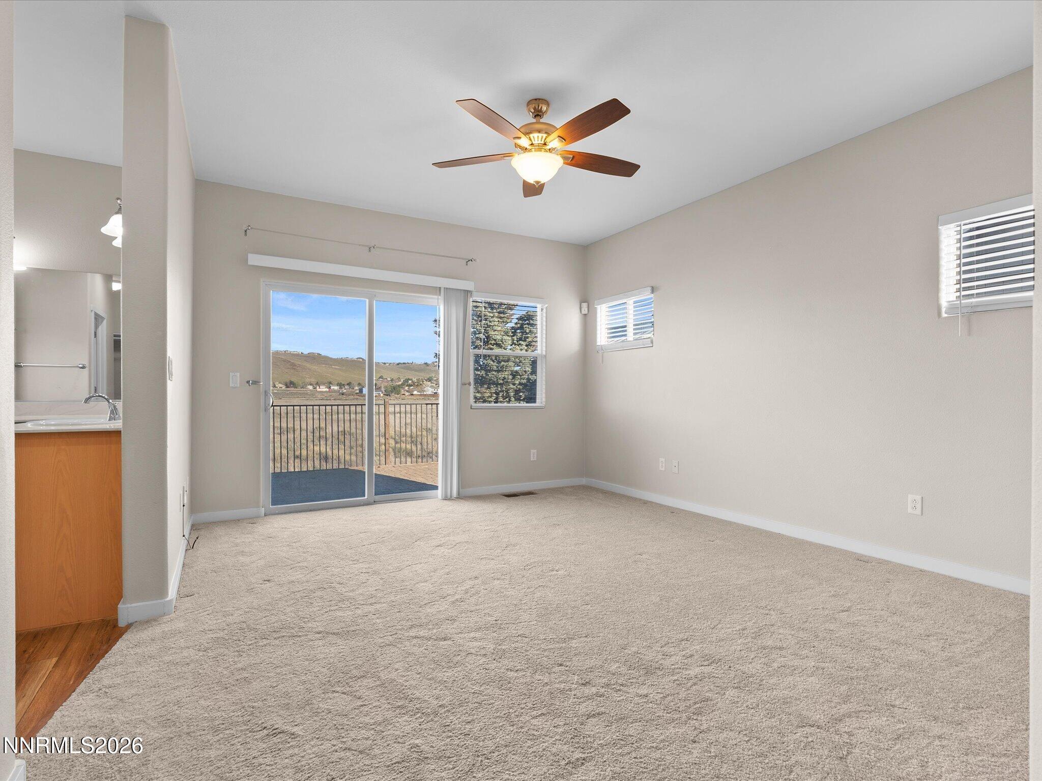 5570 Knoll View Way Sparks, NV 89436 - Photo 35 of 69 a view of an empty room with a window