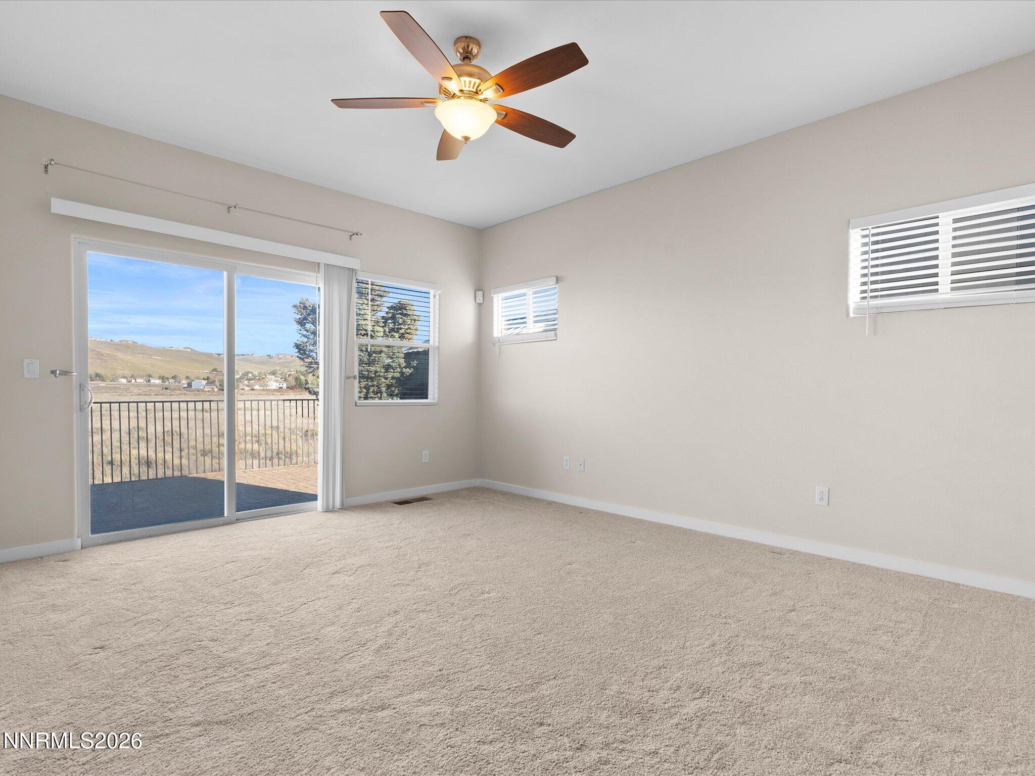 5570 Knoll View Way Sparks, NV 89436 - Photo 37 of 69 a view of an empty room with a window