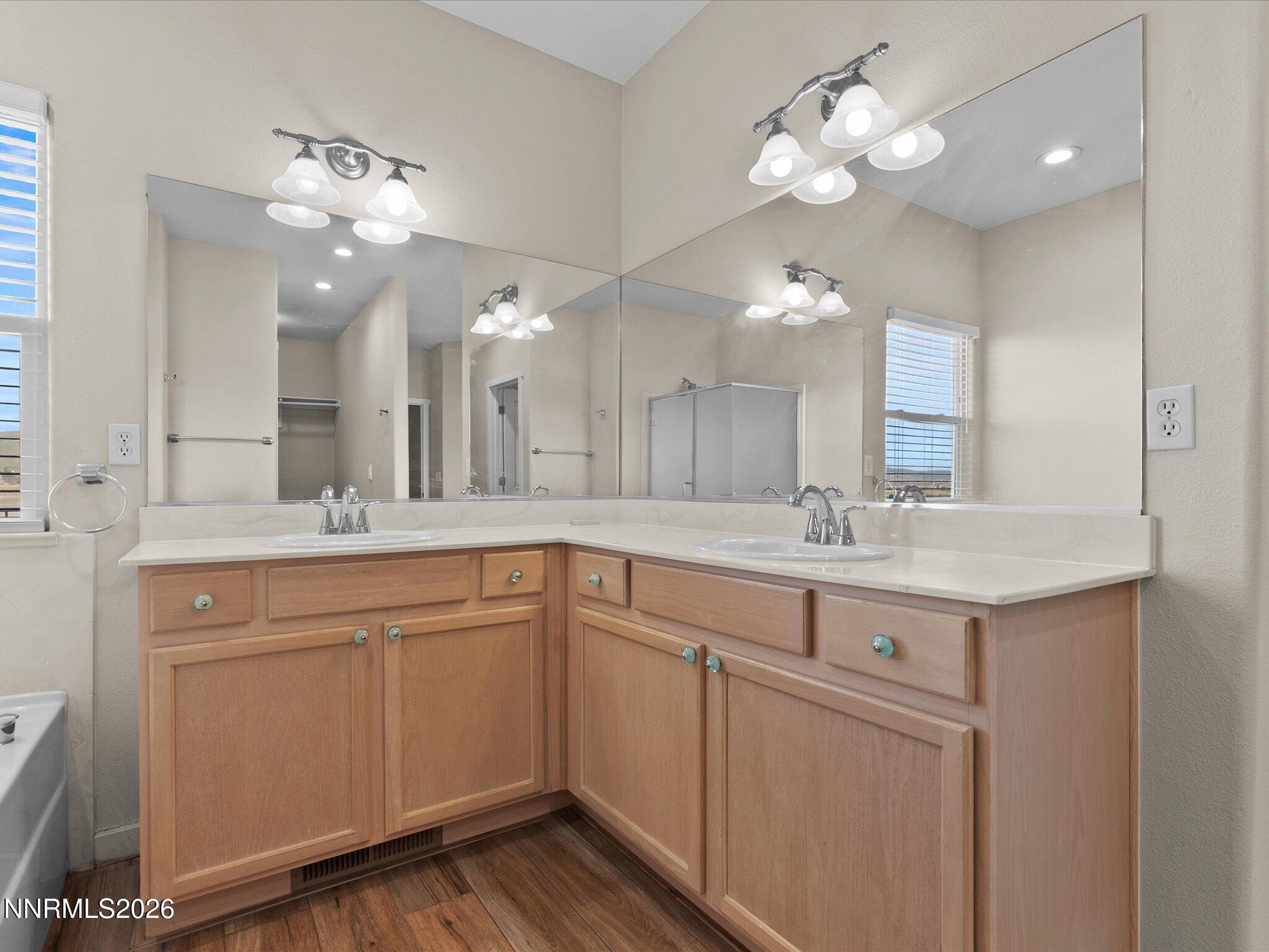 5570 Knoll View Way Sparks, NV 89436 - Photo 43 of 69 a bathroom with a sink vanity and a mirror