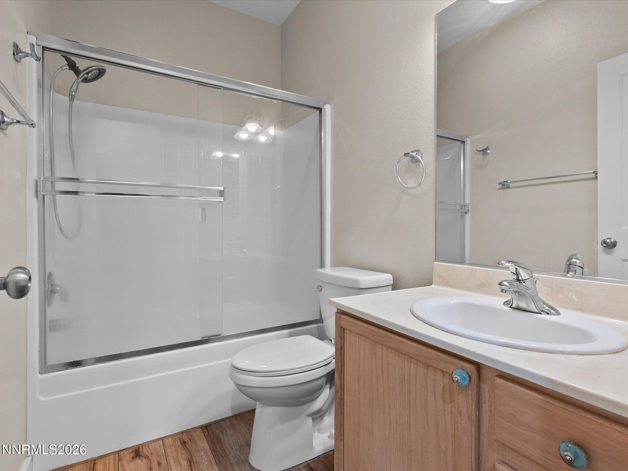 5570 Knoll View Way Sparks, NV 89436 - Photo 47 of 69 a bathroom with a sink a toilet and shower