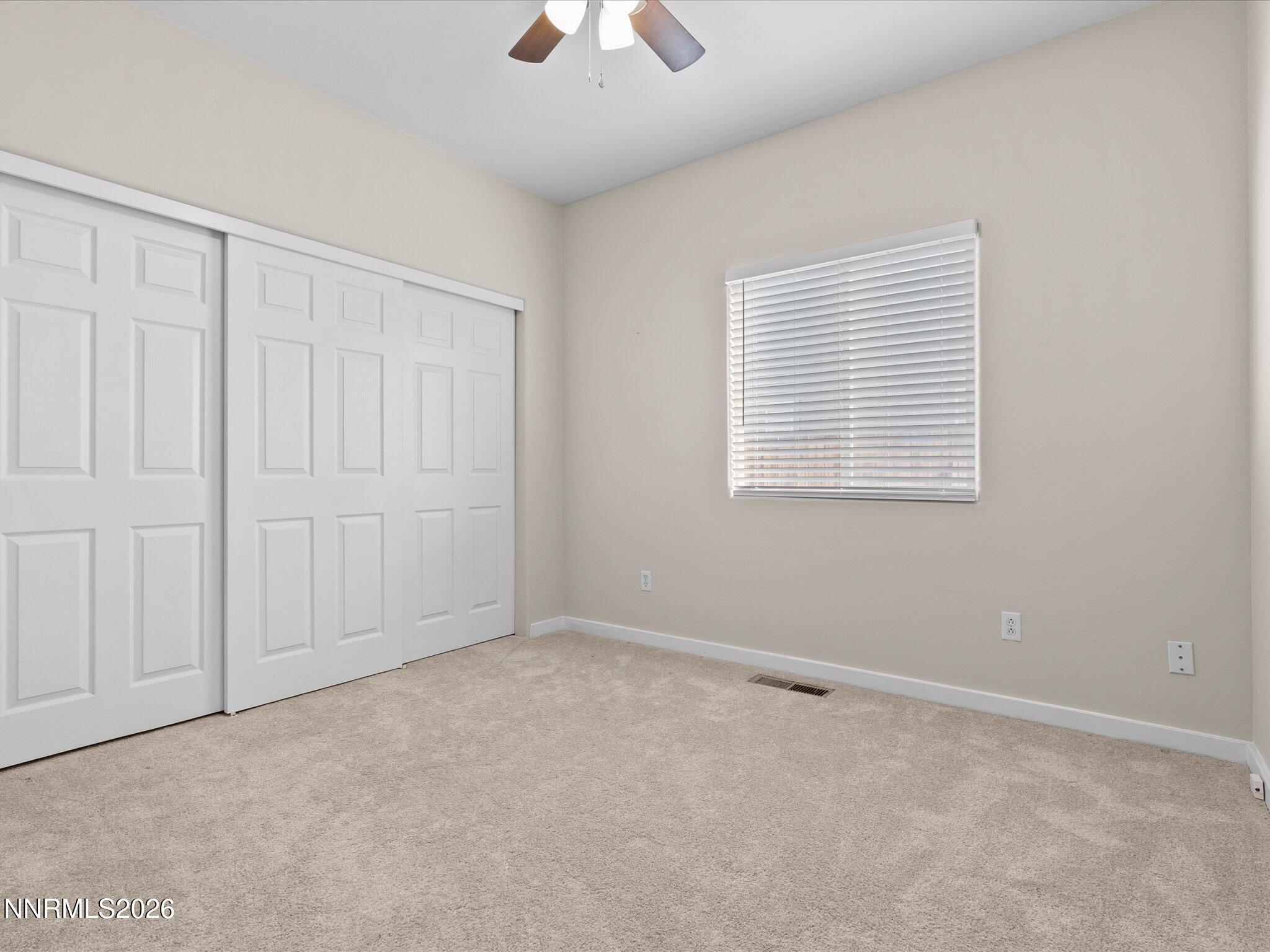 5570 Knoll View Way Sparks, NV 89436 - Photo 48 of 69 an empty room with a empty space and a window