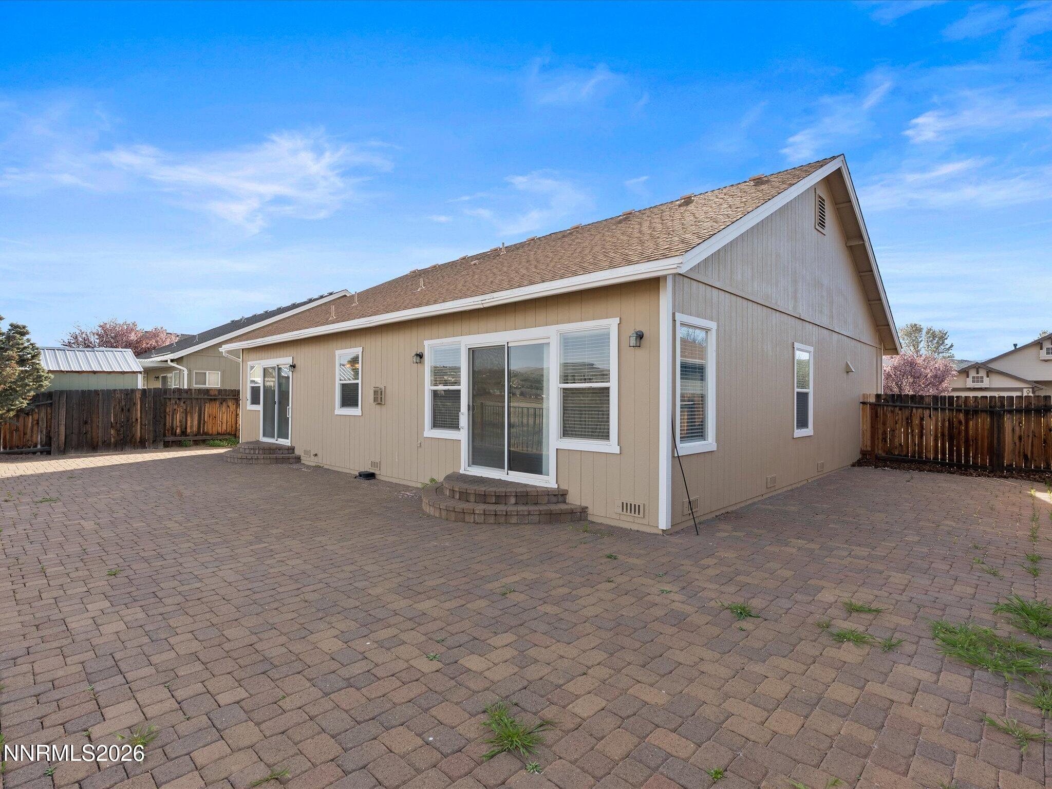 5570 Knoll View Way Sparks, NV 89436 - Photo 50 of 69 a view of a house with a backyard