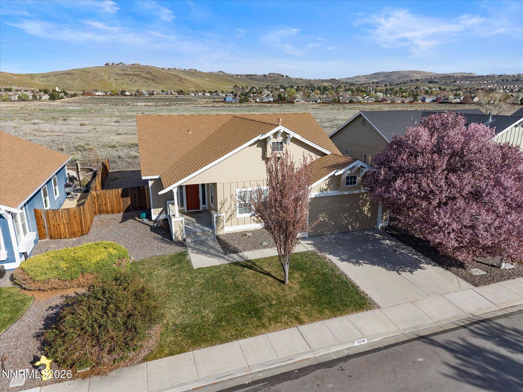 5570 Knoll View Way Sparks, NV 89436 - Photo 66 of 69 an aerial view of a house with a yard and lake view