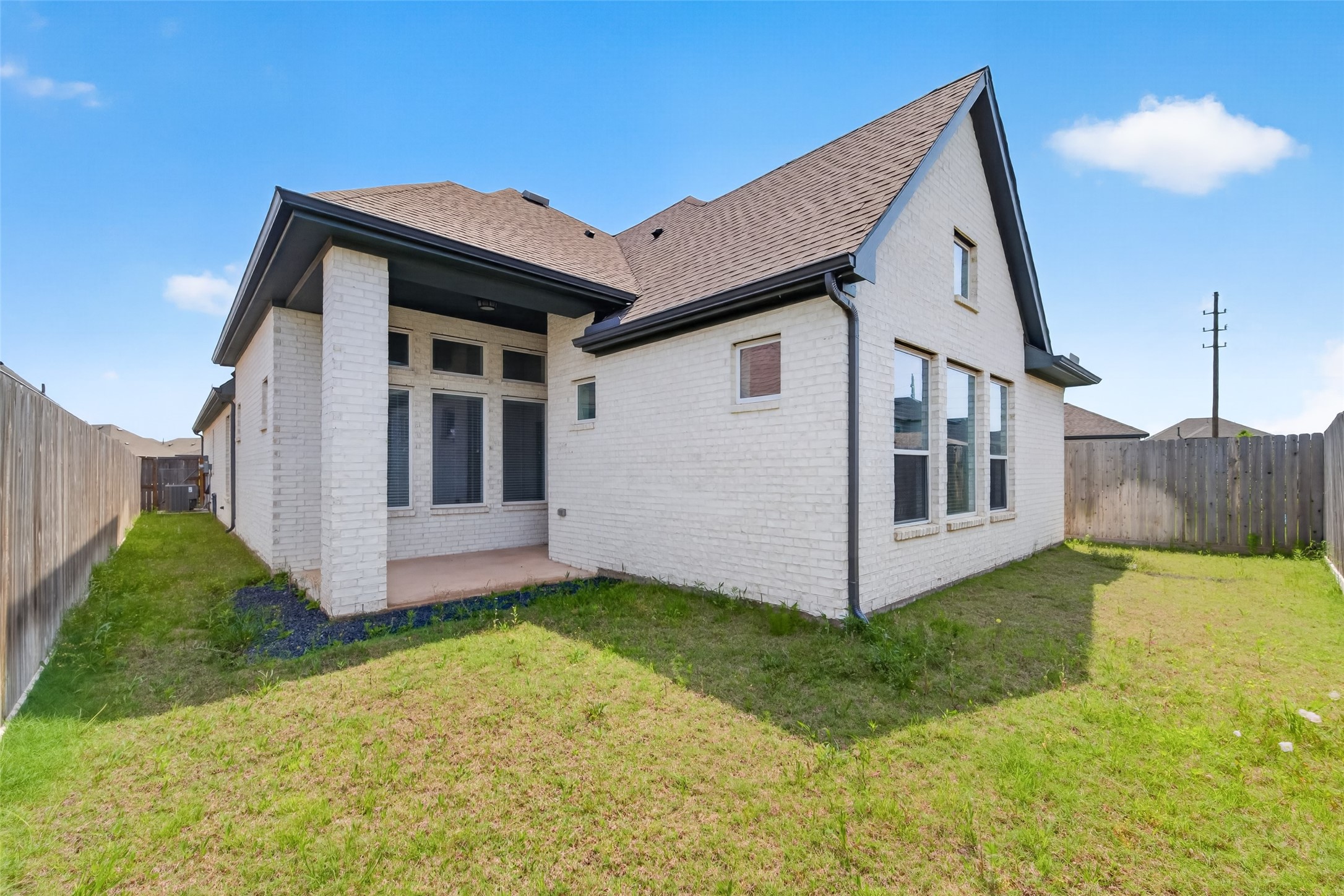 211 Amaranth Way Richmond, TX 77406 - Photo 25 of 26 a view of a house with a yard