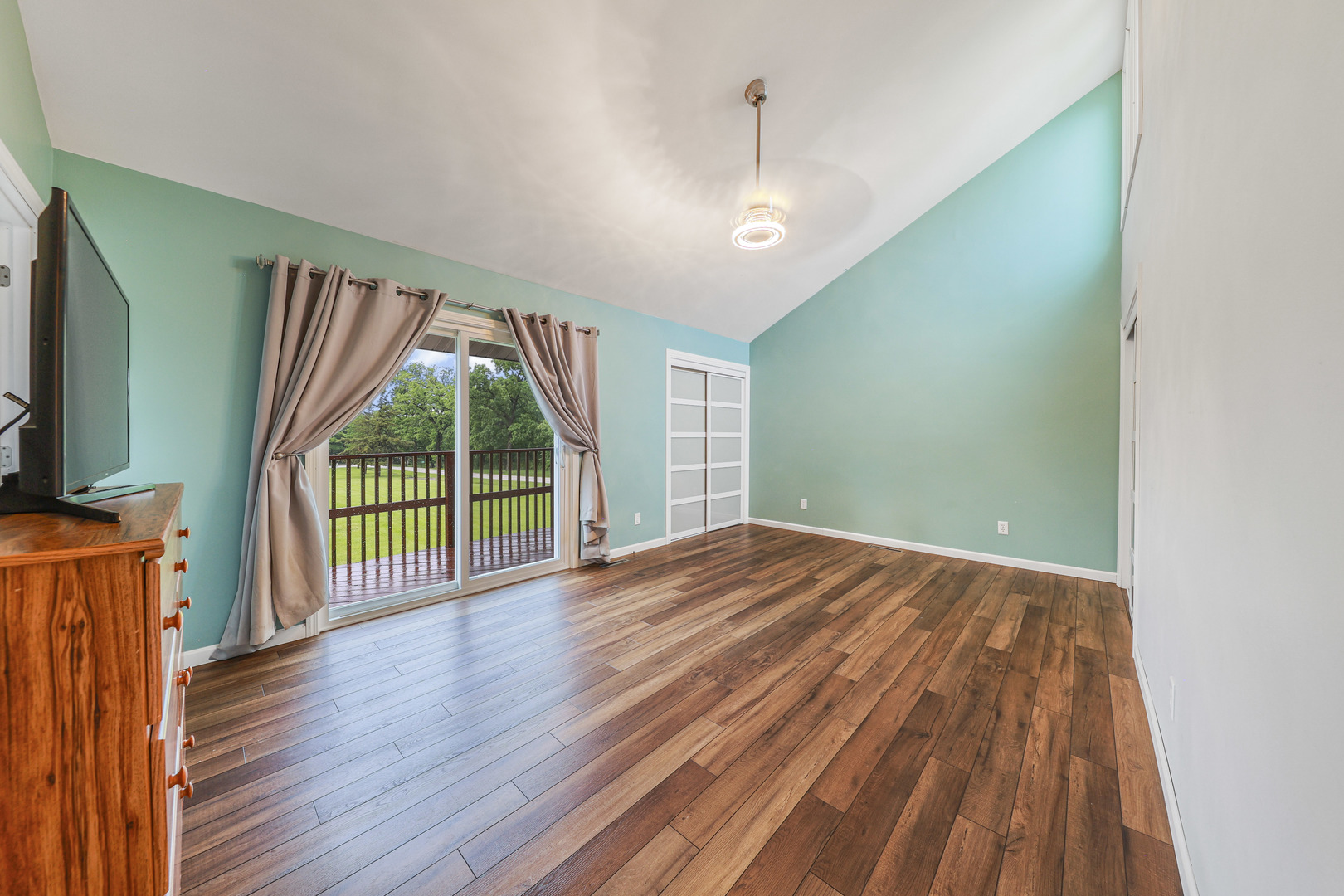 2433 East 2850th Road Marseilles, IL 61341 - Photo 11 of 20 wooden floor in an empty room with a window