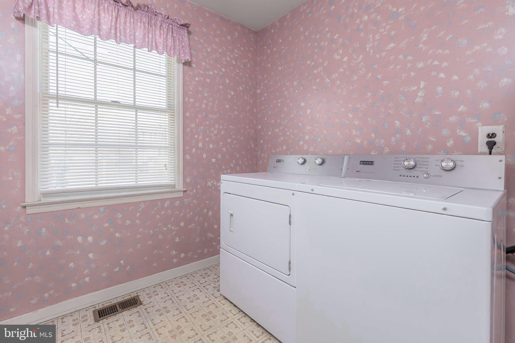 17 Framingham Road Beverly, NJ 08010 - Photo 10 of 24 a utility room with dryer and washer
