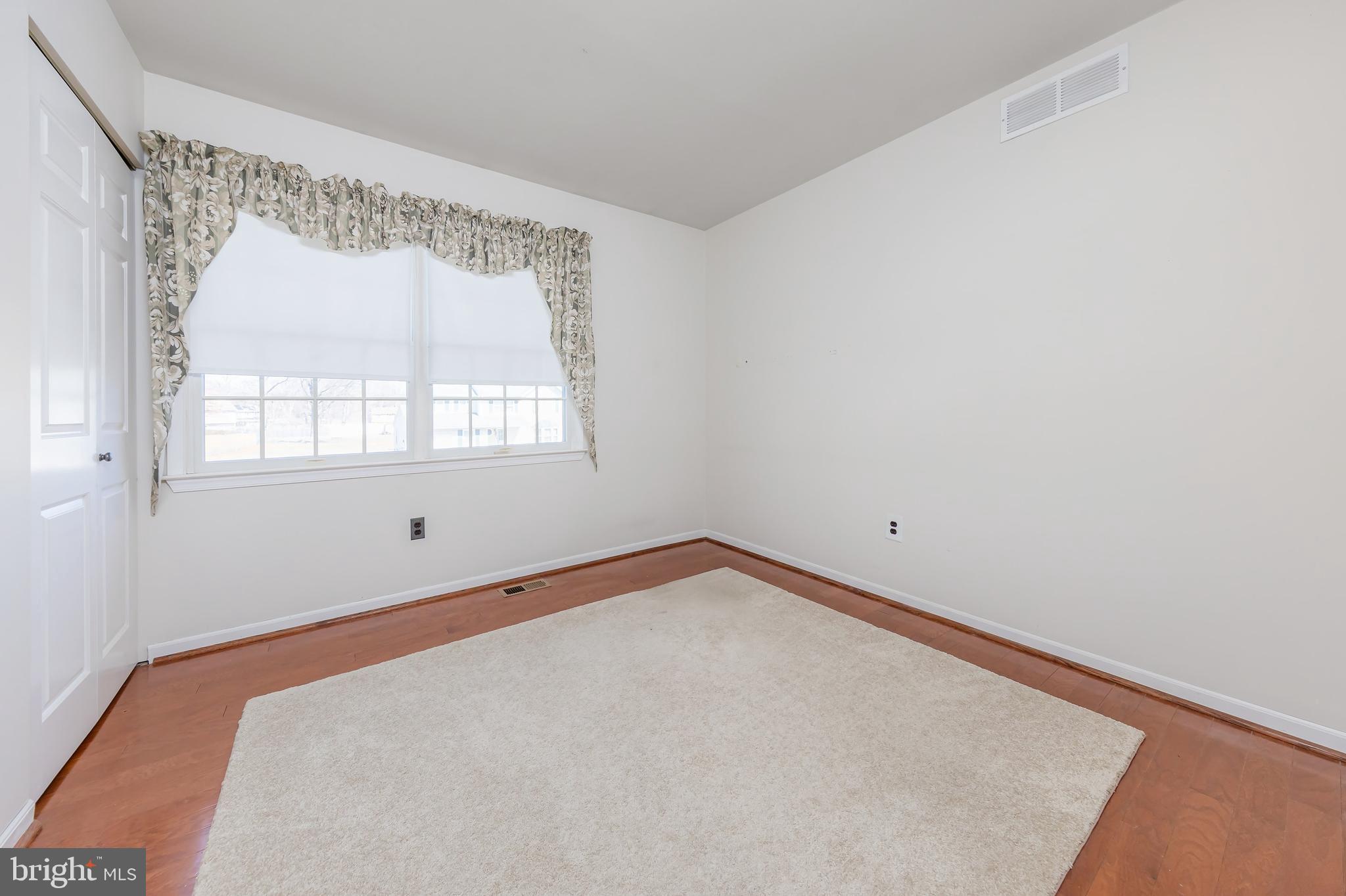 17 Framingham Road Beverly, NJ 08010 - Photo 14 of 24 a view of a room that has a window in it