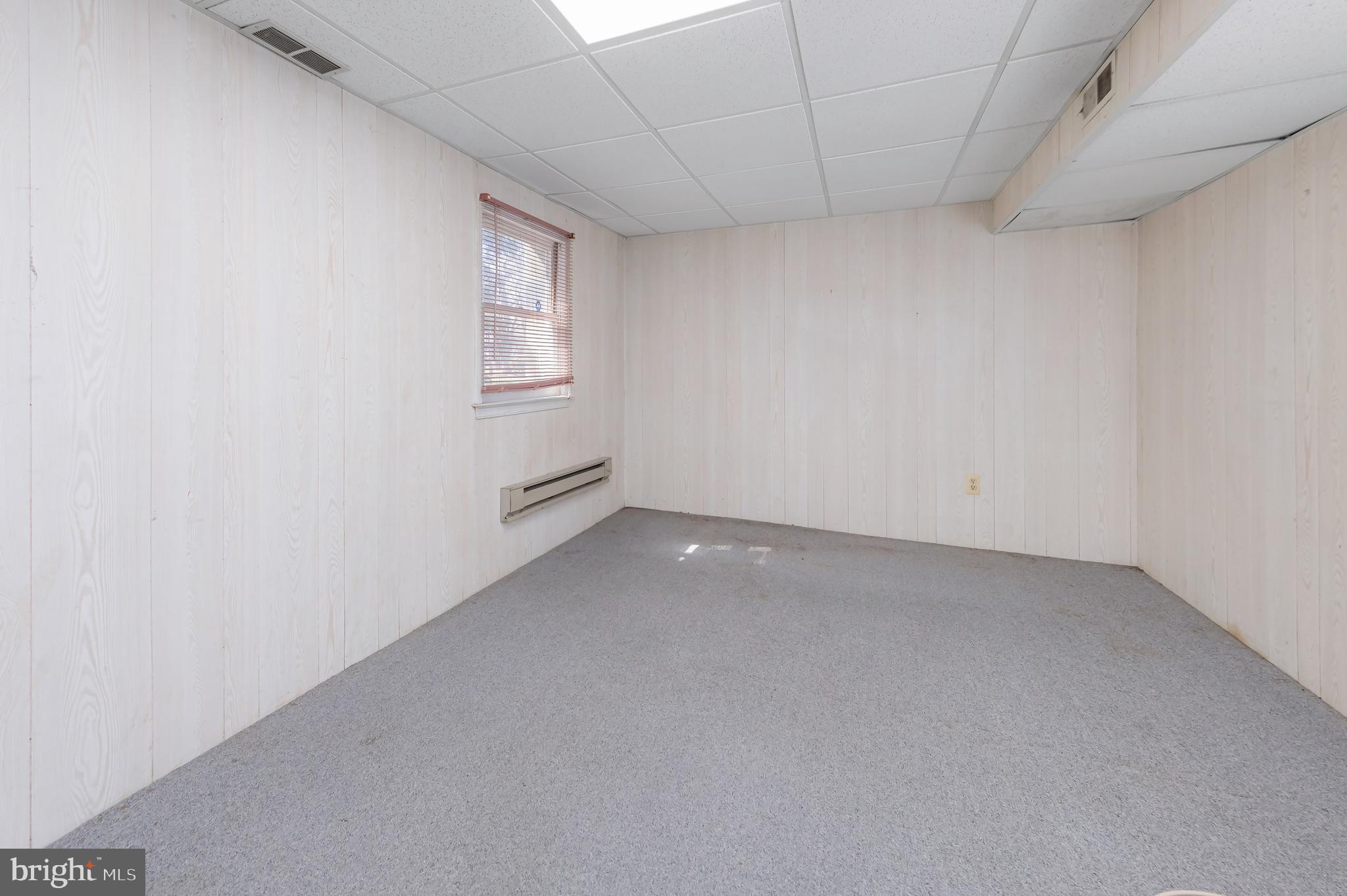 17 Framingham Road Beverly, NJ 08010 - Photo 19 of 24 a view of an empty room with a window