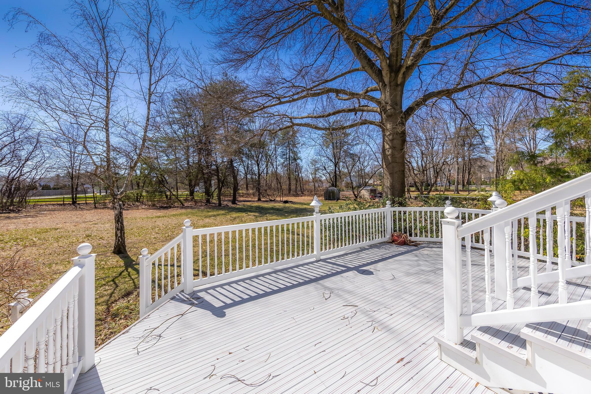 17 Framingham Road Beverly, NJ 08010 - Photo 22 of 24 a view of a pathway with a wrought fence