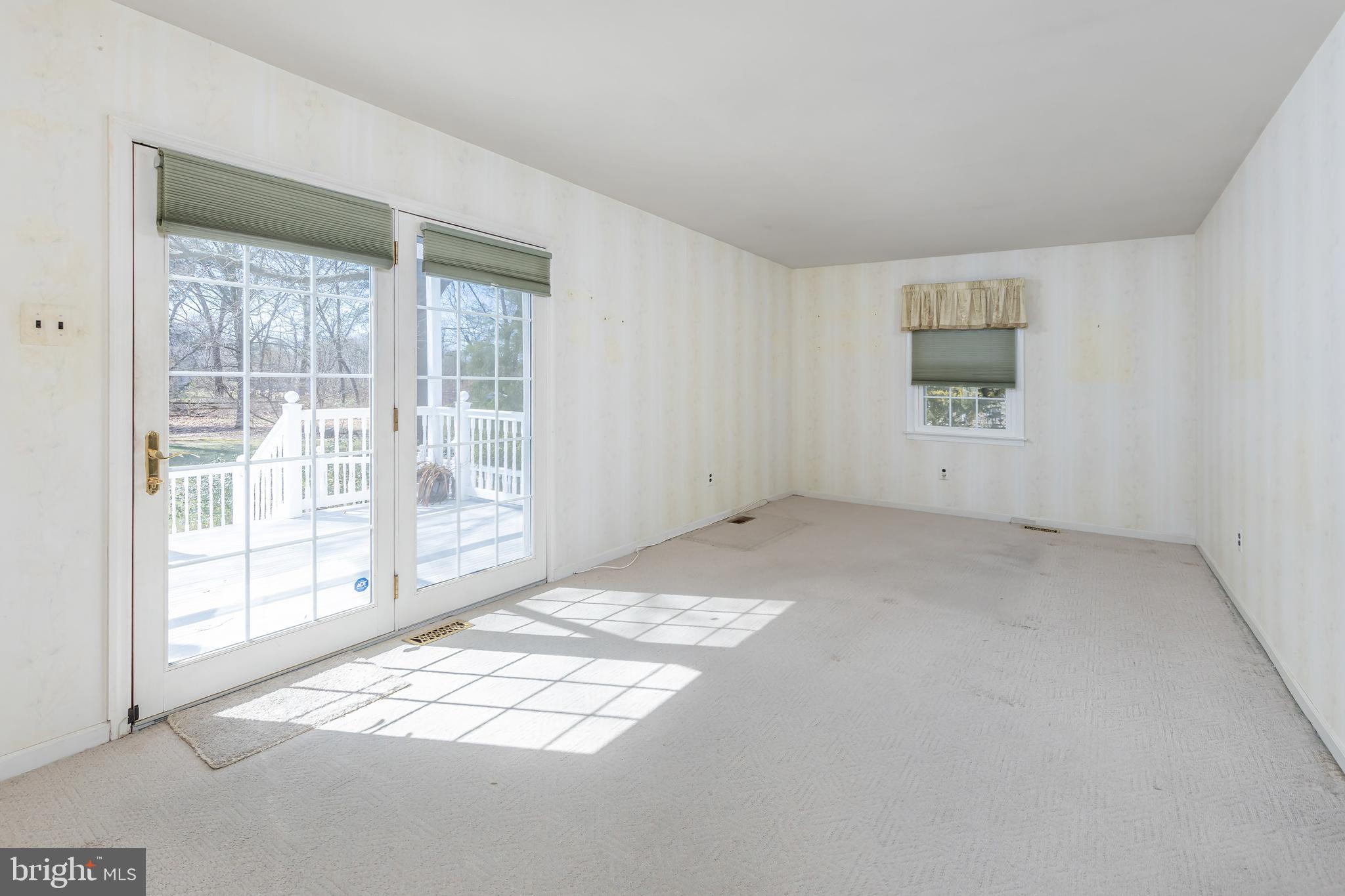 17 Framingham Road Beverly, NJ 08010 - Photo 9 of 24 an empty room with windows