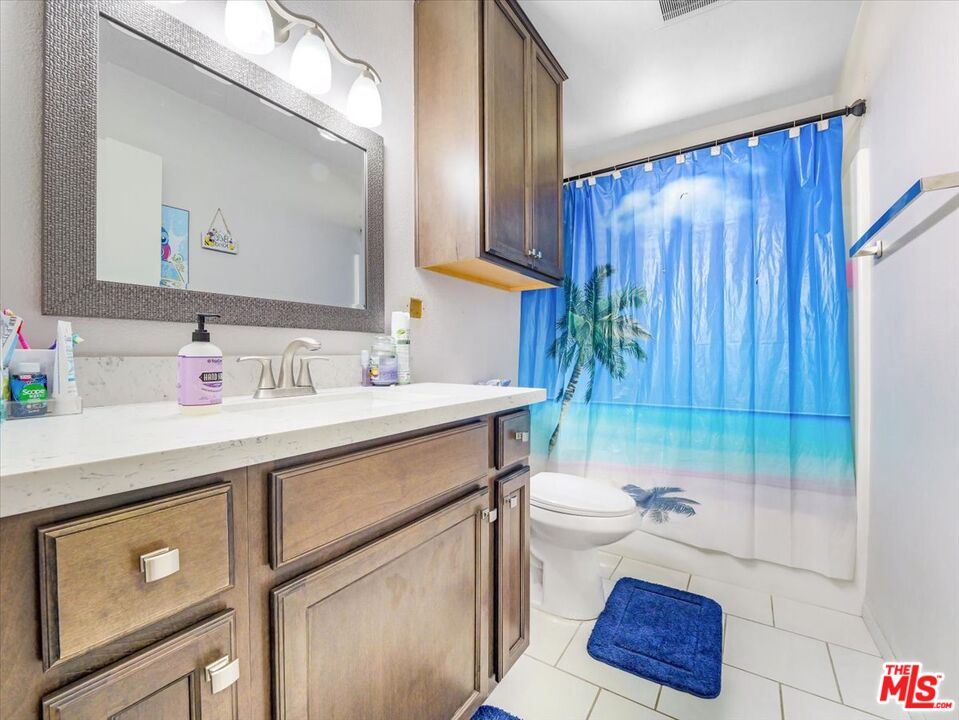 9446 Green Road Pinon Hills, CA 92372 - Photo 18 of 24 a bathroom with a sink toilet and shower