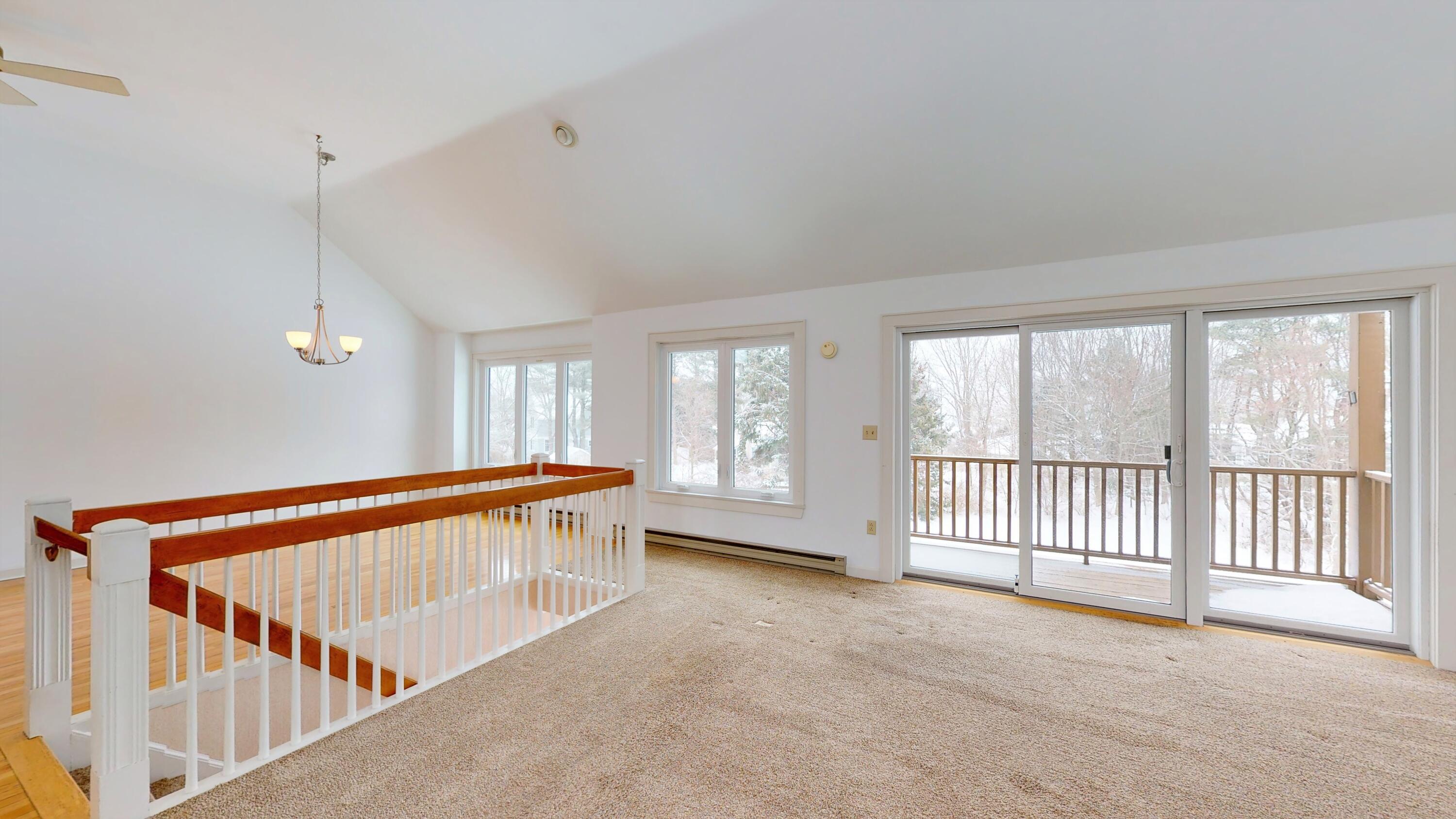 241 Sea Road, Unit 9 Kennebunk, ME 04043 - Photo 7 of 40 Living Room with Staircase & Dining Room