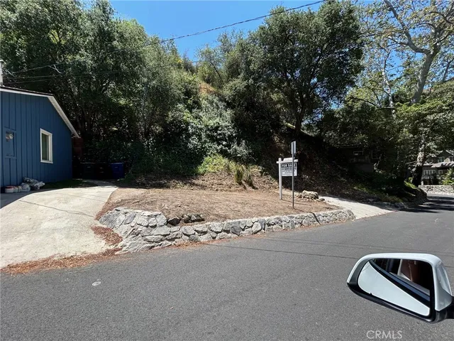 a view of a backyard of a house