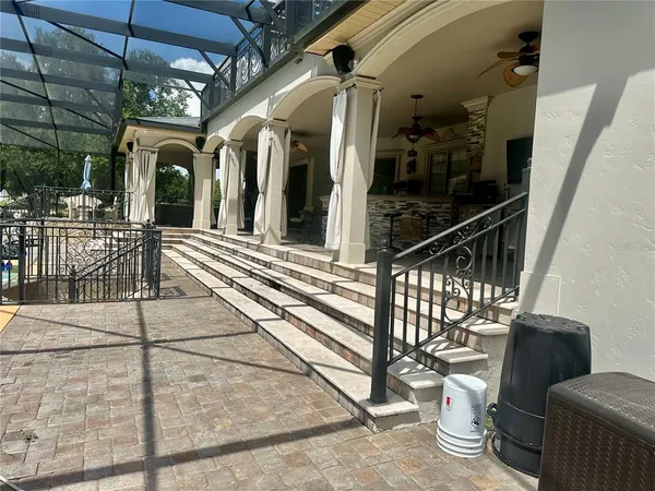 a view of a porch with furniture