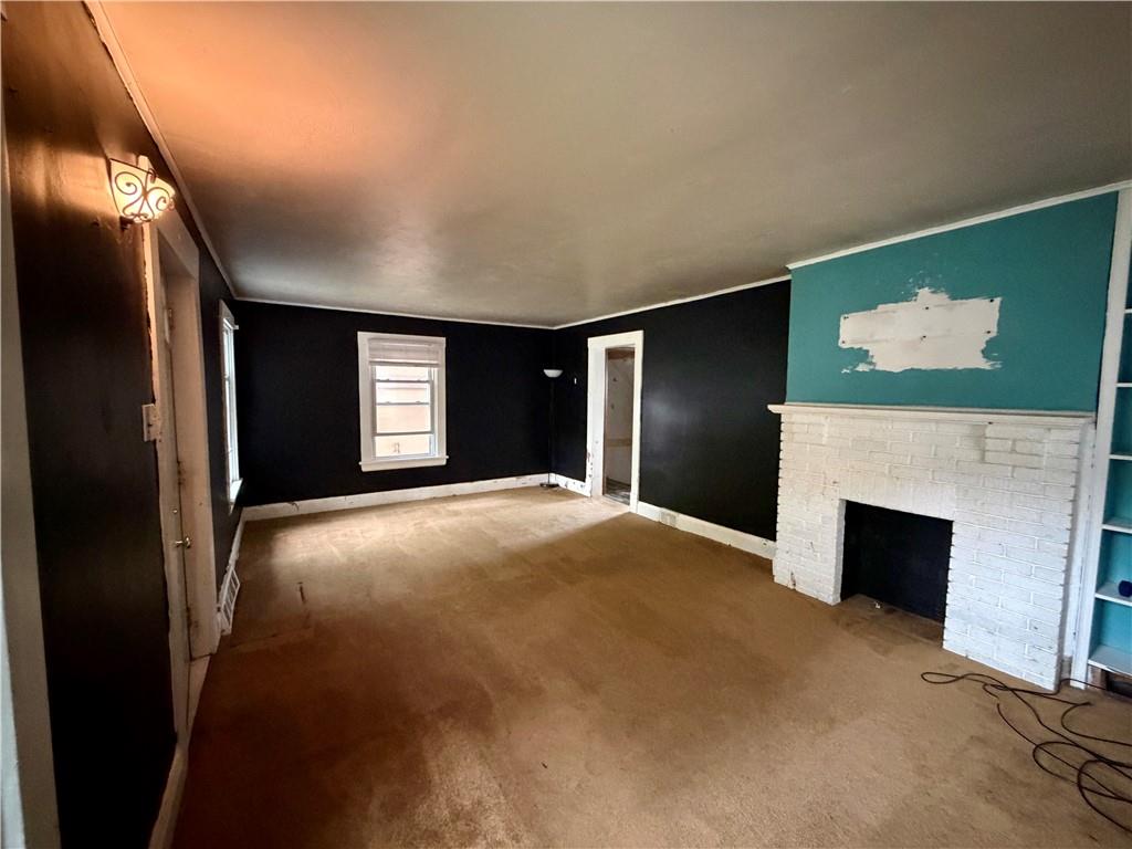 118 Ida Avenue Donora, PA 15033 - Photo 3 of 18 a view of a livingroom with a fireplace