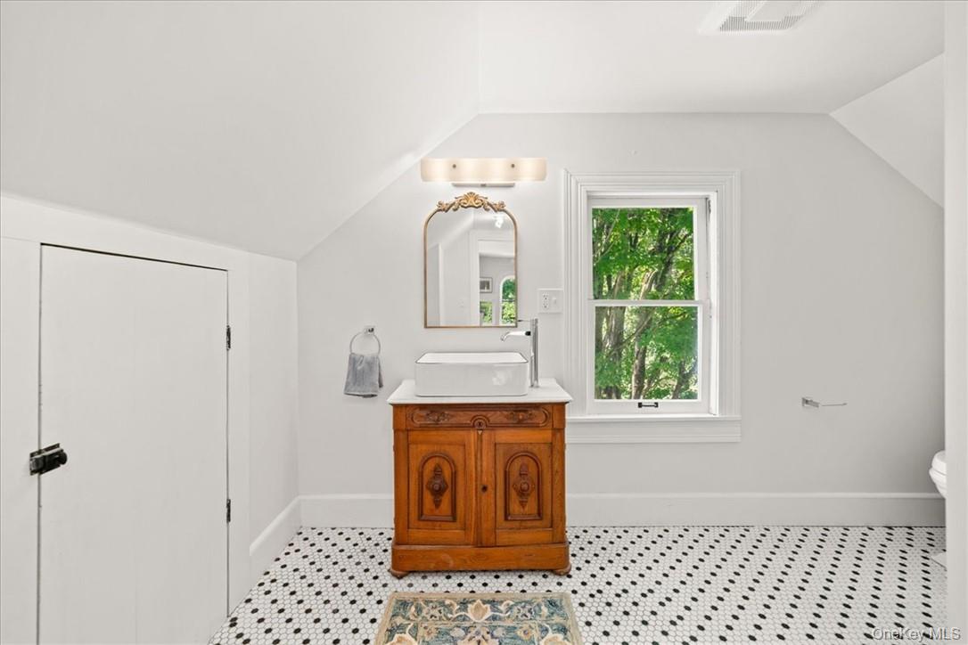 2585 River Road Damascus, PA 18415 - Photo 21 of 41 a bathroom with a sink a vanity and a shower